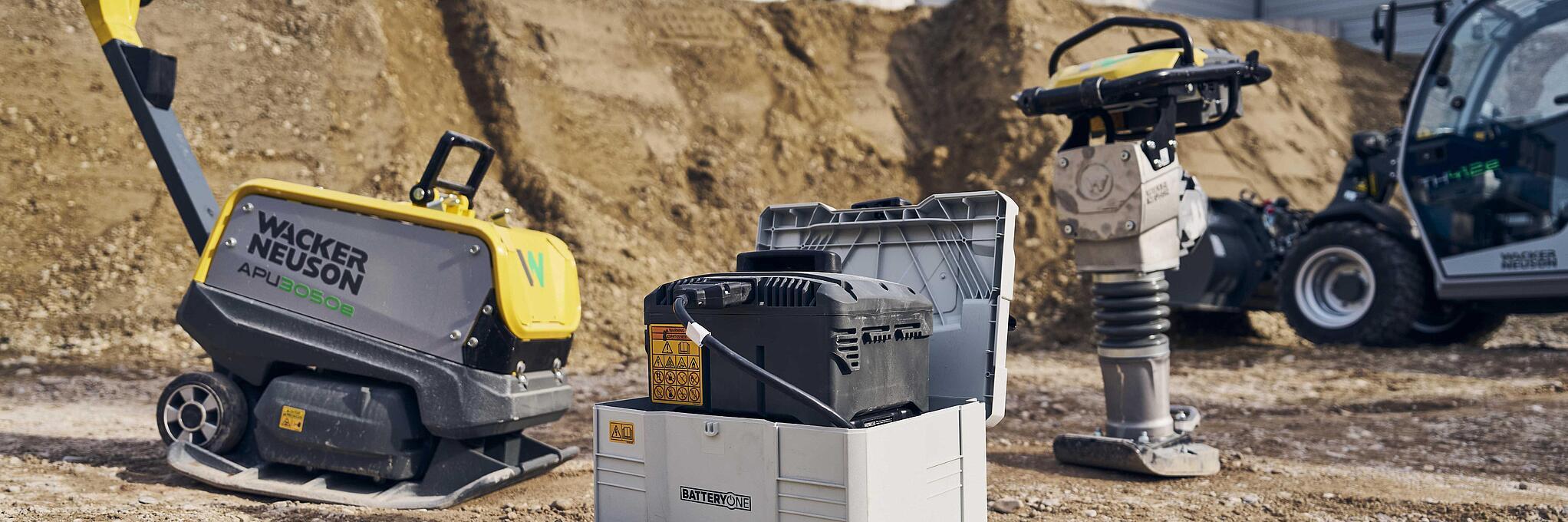 Line up of Wacker Neuson zero emission light equipment at a construction site