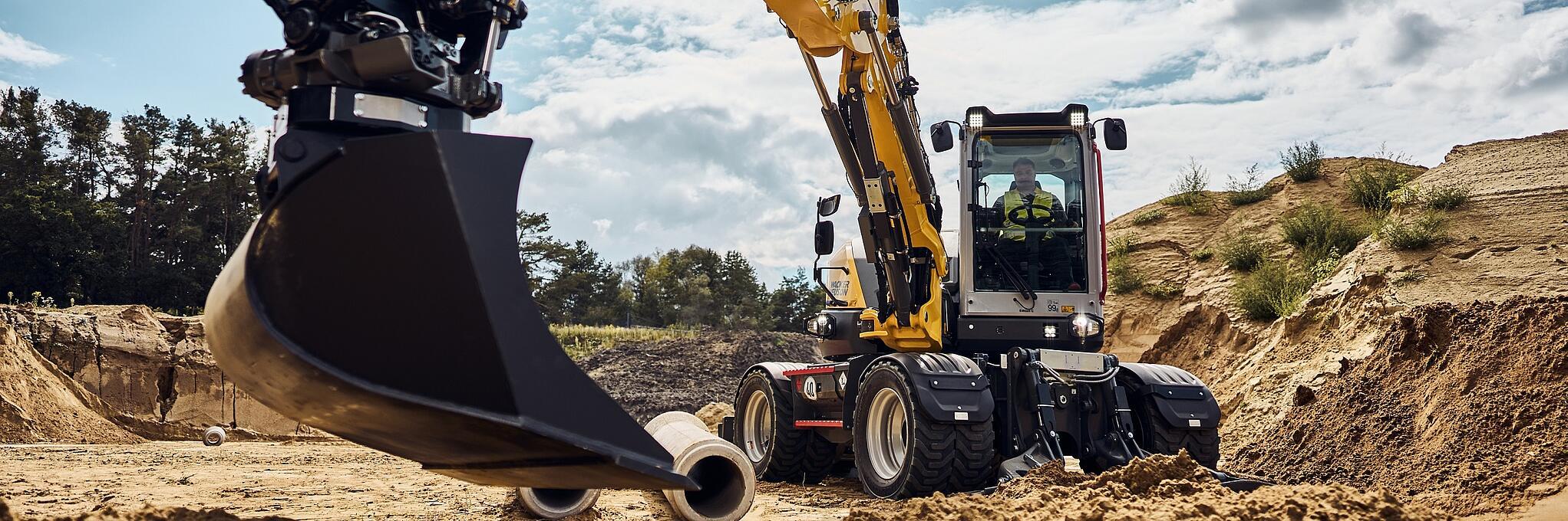 excavator EW100 in action