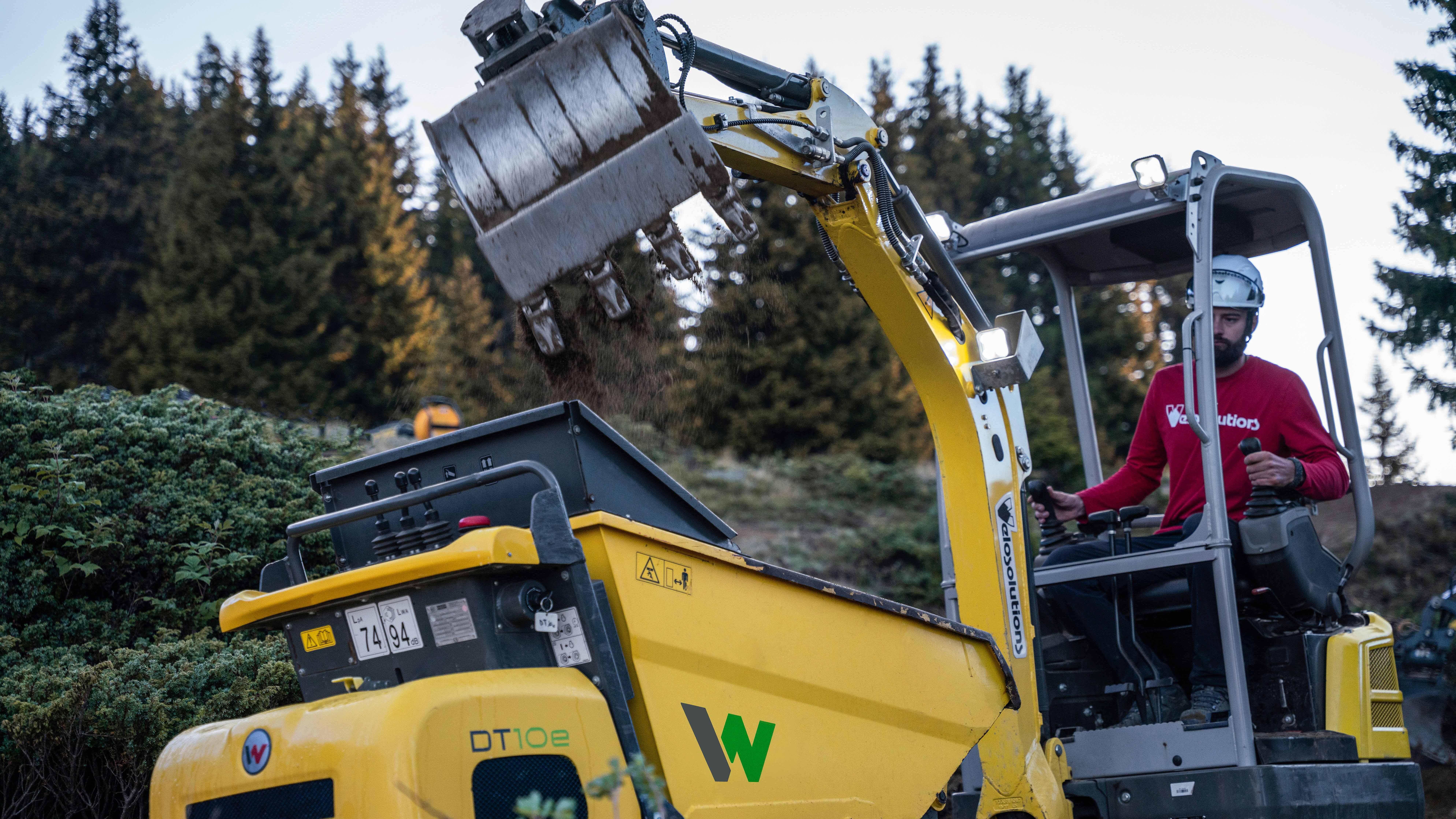 Excavator EZ17e and Track Dumper DT10e in use