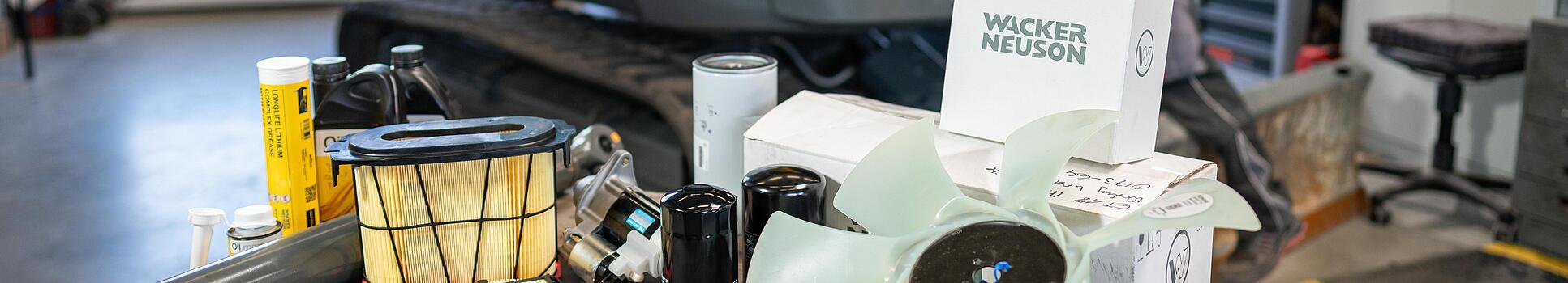 various wacker neuson spare parts in workshop